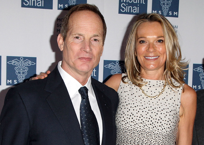 Man in a dark suit and woman in a sleeveless dress at a Mount Sinai event revealing Epstein obsession details.