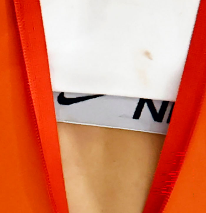 Close-up of Jutta Leerdam’s Nike underwear visible beneath an orange garment, relating to Olympics fans’ interest. Close-up of Jutta Leerdam’s Nike underwear visible beneath an orange garment, relating to Olympics fans’ interest.