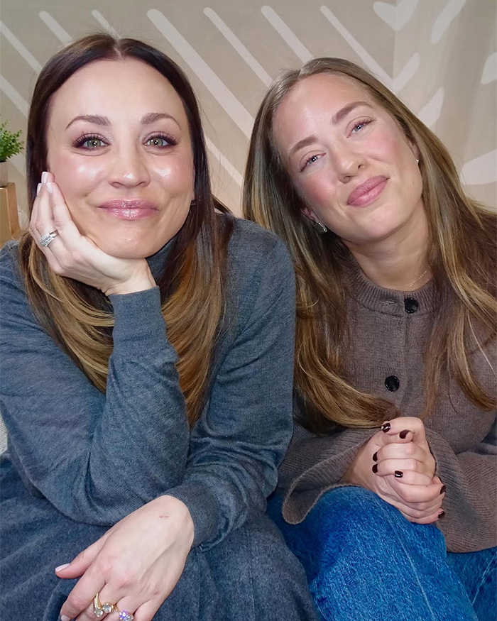 Kaley Cuoco smiling with a friend indoors, sharing a moment related to Botox and Big Bang Theory insights.