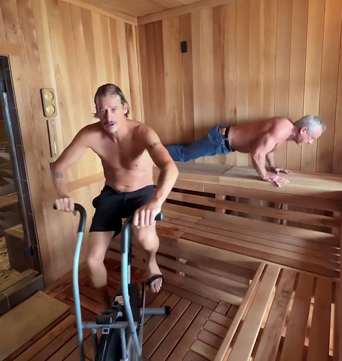 RFK Jr. and Kid Rock shirtless working out in a wooden sauna, with one using exercise equipment and the other doing push-ups. RFK Jr. and Kid Rock shirtless working out in a wooden sauna, with one using exercise equipment and the other doing push-ups.