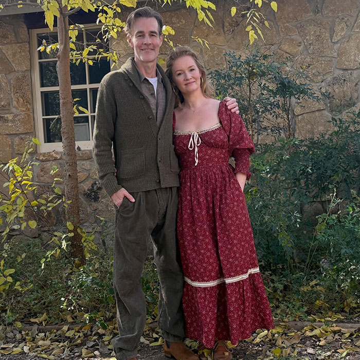 James Van Der Beek and a woman standing outdoors by a stone wall, related to GoFundMe and money manager debate.