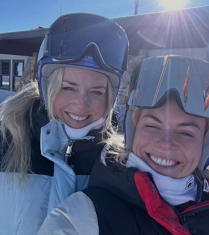 Lindsey Vonn smiling outdoors in ski gear, enjoying a moment after major life update following Olympics accident.