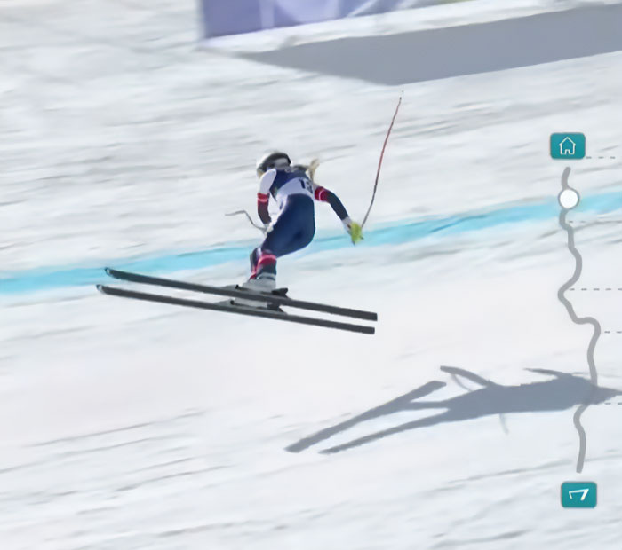Skier in mid-air during a jump, highlighting Lindsey Vonn's life update after a horrific Olympics accident.