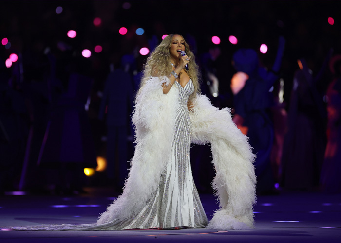 Mariah Carey performing at the 2026 Winter Games opening ceremony, facing backlash over her show.