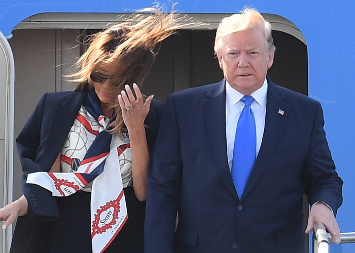 Melania Trump’s perfectly polished appearance disrupted as wind blows her hair, revealing a hidden secret during public appearance.