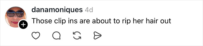 Melania Trump outdoors with wind blowing her hair, revealing a hidden hair clip and disrupting her polished appearance.