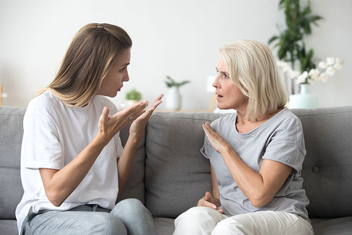 Woman and mother-in-law having a tense conversation about the dog and the shelter situation at home.