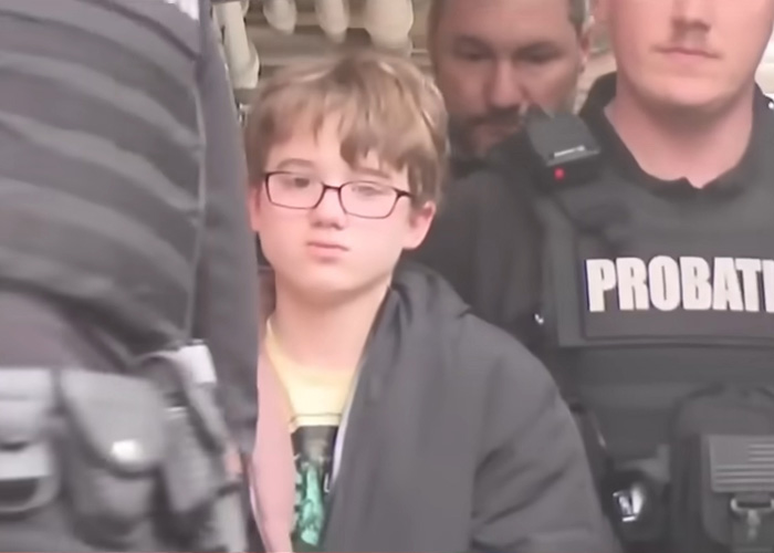 Heartbroken mom of 11-year-old accused in adoptive father’s slaying speaks out amid legal proceedings.