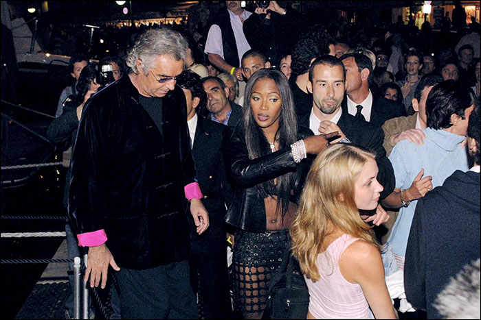 Naomi Campbell at a crowded event with Epstein files revealing offers involving Ghislaine Maxwell and playmates.
