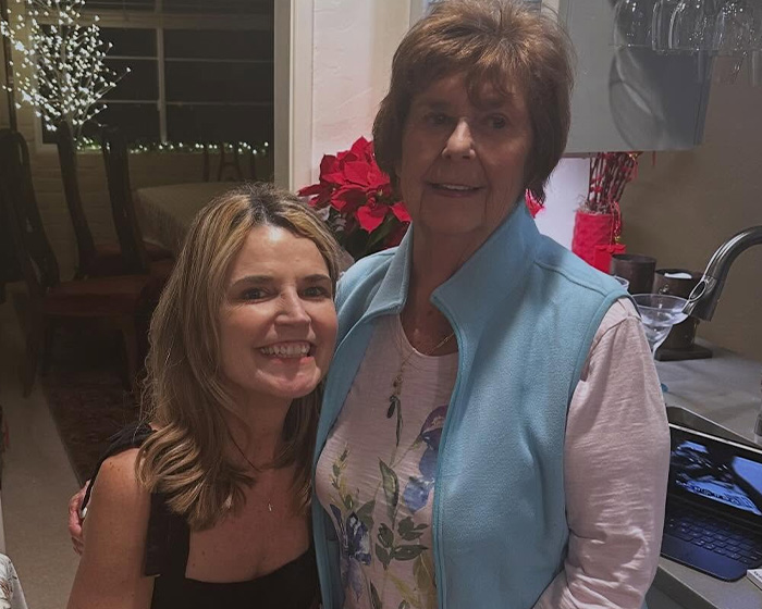 Two women smiling indoors with kitchen and holiday decorations, related to Nancy Guthrie suspect FBI images release.