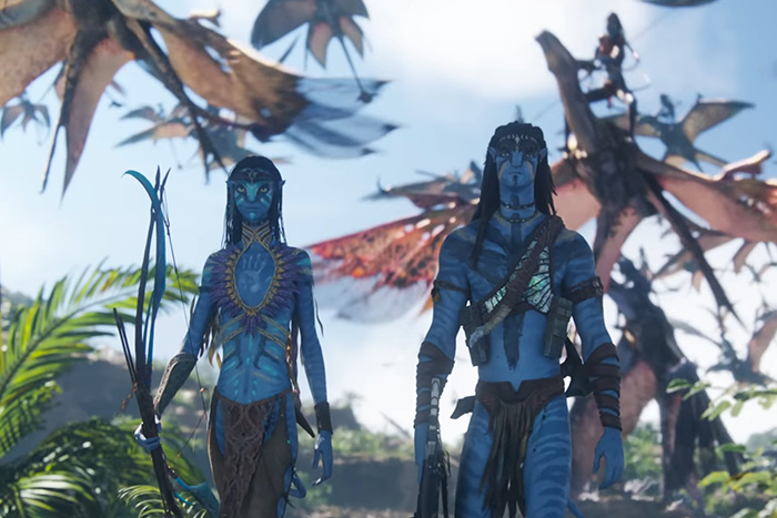 Two blue-skinned characters from a movie scene with flying creatures in the background, highlighting Oscar nominated movies 2026.