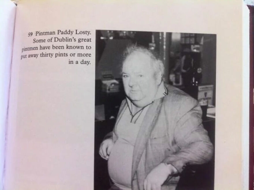 Black and white photo of a man featured among 36 gigachads admired in their countries, showing a casual pose indoors.
