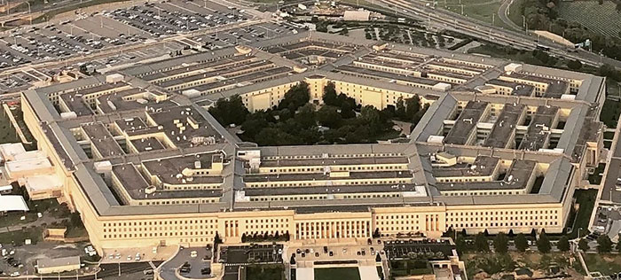 Aerial view of a massive Pentagon building, an example of architectural malpractice and costly ugly architecture.