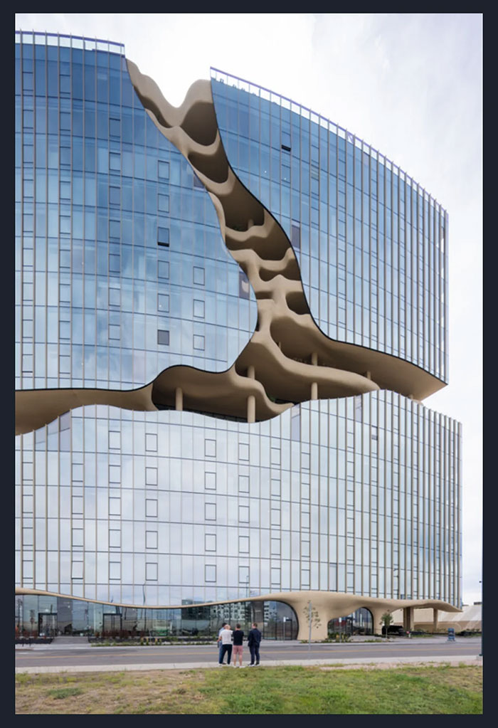 Modern building with unusual c*****d facade design showcasing architectural malpractice and controversial ugly buildings.