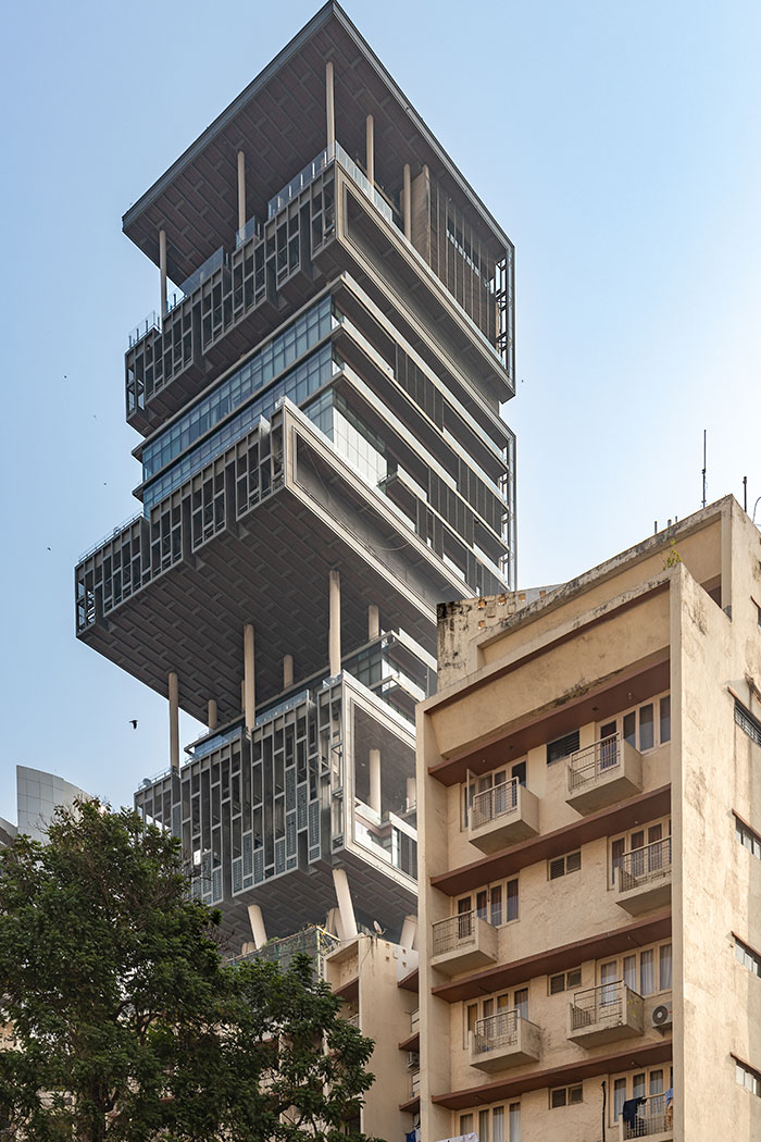Futuristic stacked architectural building with glass and concrete elements, showcasing a controversial architectural malpractice design.