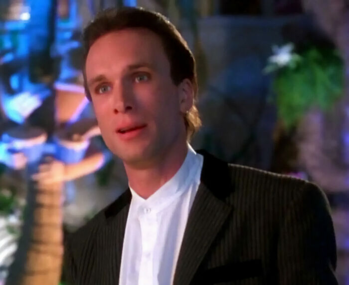 Peter Greene in a dramatic scene wearing a black suit and white shirt, related to cause of passing that stuns fans.