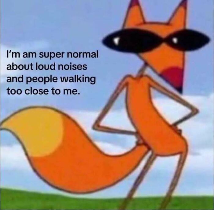 Cartoon fox wearing sunglasses with text about being normal around loud noises in a hilarious memes image.