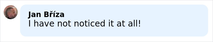 Olympic ice skater performing on the rink, recovering skillfully from a wardrobe malfunction during routine.