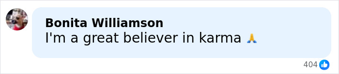 Screenshot of a social media comment stating belief in karma with a praying emoji and 404 likes.