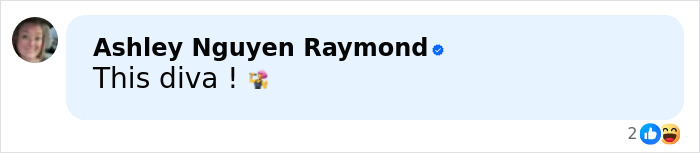 Profile photo of a woman commenting on social media about a boutique owner involved in a town scandal with growing lips.