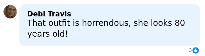 Comment by Debi Travis criticizing an outfit, describing it as horrendous and making someone look 80 years old.