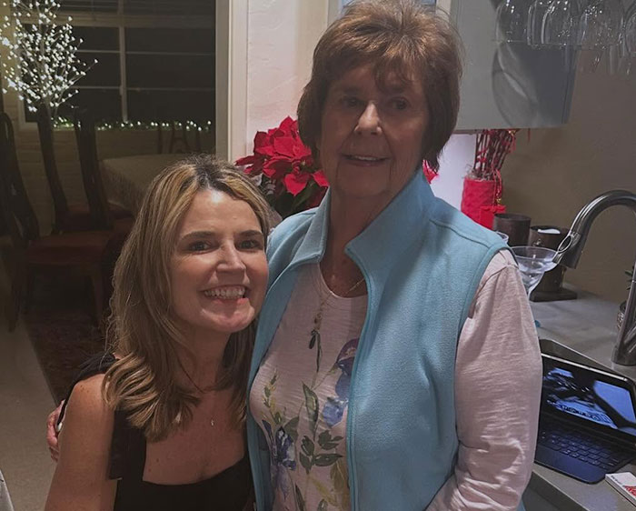 Two women smiling indoors, related to Savannah Guthrie&rsquo;s brother-in-law and missing mom case.