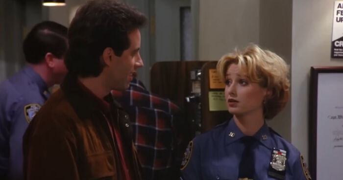 Scene from Seinfeld featuring a female police officer and a man talking about the Pitt star's hilarious confession.