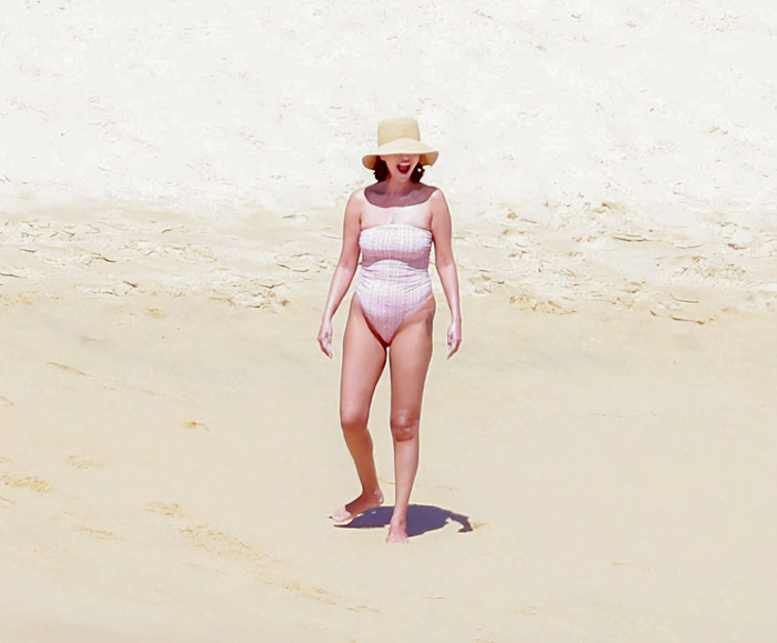 Selena Gomez's Latest Swimsuit Snaps Spark Heated Debate After Fans Notice Odd Detail