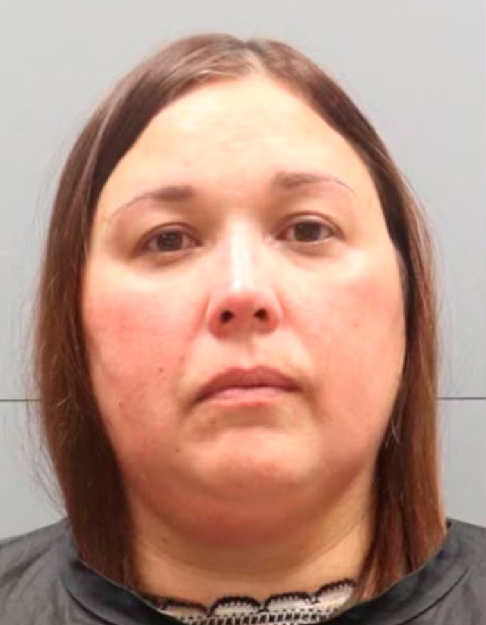 Mugshot of a woman involved in a racist attack case with witnesses describing a disturbing scene. Mugshot of a woman involved in a racist attack case with witnesses describing a disturbing scene.