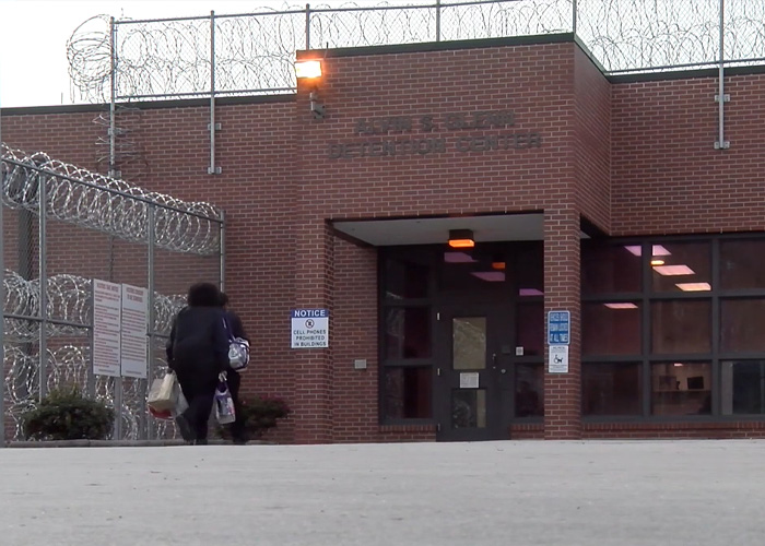 Entrance of a correctional facility with barbed wire where a teacher was jailed over alleged racist attack incidents. Entrance of a correctional facility with barbed wire where a teacher was jailed over alleged racist attack incidents.