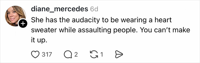 Social media comment criticizing someone wearing a heart sweater during an alleged racist attack incident involving a teacher. Social media comment criticizing someone wearing a heart sweater during an alleged racist attack incident involving a teacher.