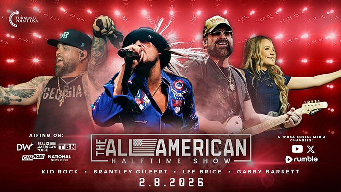 Kid Rock performing at Turning Point USA alternative Super Bowl show with Brantley Gilbert and others on stage.
