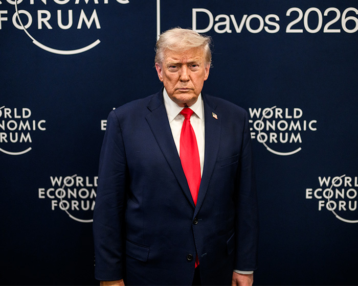 Former President Trump at the World Economic Forum in Davos 2026, discussing plans to release UFO files and related accusations.