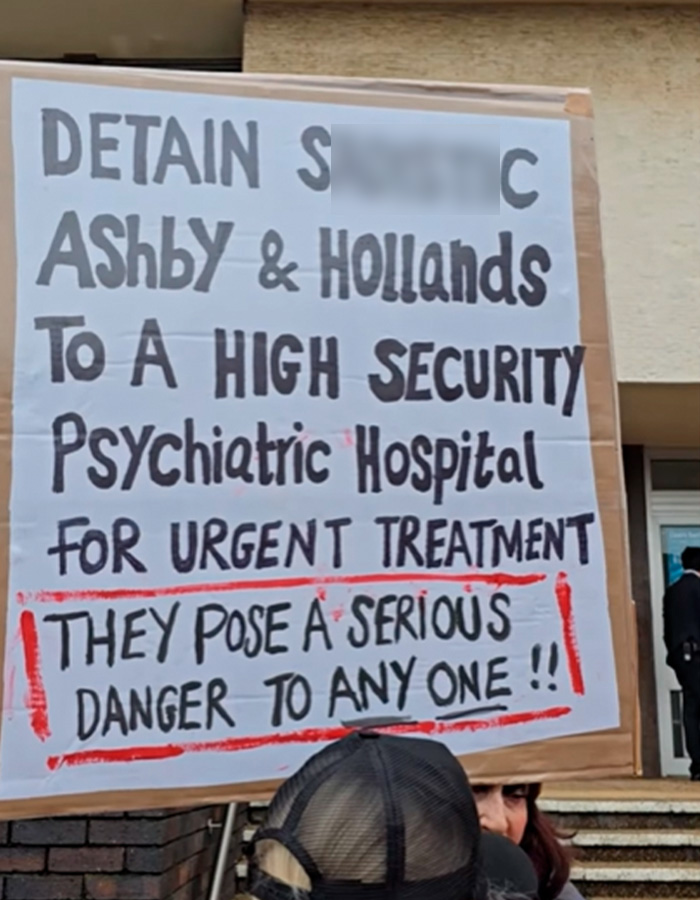 Protest sign demanding urgent psychiatric treatment and high security detention for students linked to fireworks sheep incident.