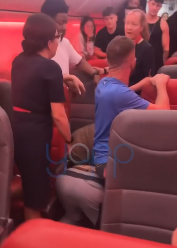 Video Captures Chaotic Brawl That Got 'Racist' Passengers Banned From Airline Video Captures Chaotic Brawl That Got 'Racist' Passengers Banned From Airline