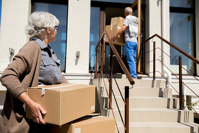 Woman fed up with in-laws constantly showing up unannounced carrying boxes to move into the house.