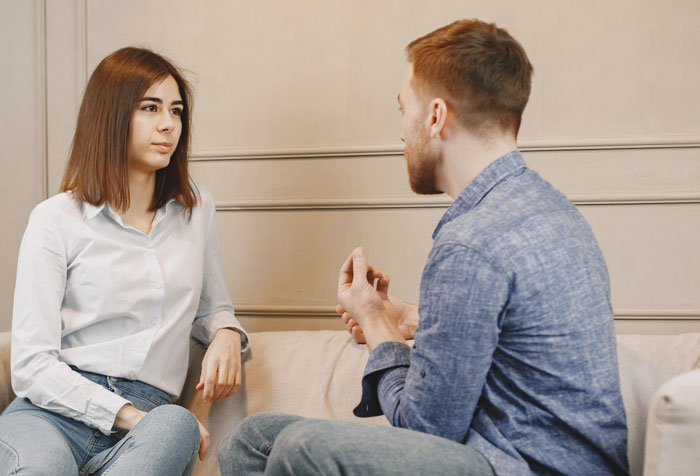 Man complaining to his wife during a serious conversation, highlighting relationship concerns and family worries.
