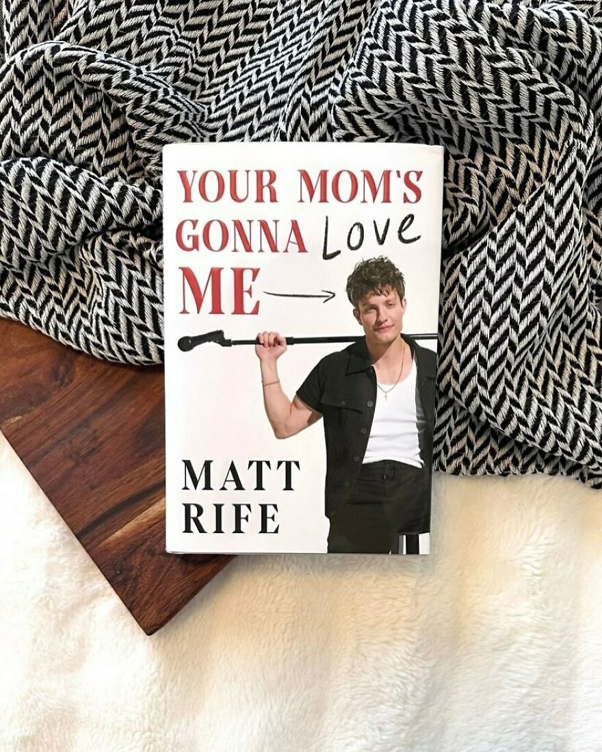 Book cover of Matt Rife's memoir Your Mom's Gonna Love Me addressing plastic surgery rumors and before and after changes. Book cover of Matt Rife's memoir Your Mom's Gonna Love Me addressing plastic surgery rumors and before and after changes.