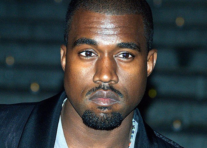 Close-up of a serious celebrity face, illustrating moments when people met celebrities who turned out to be raging jerks.