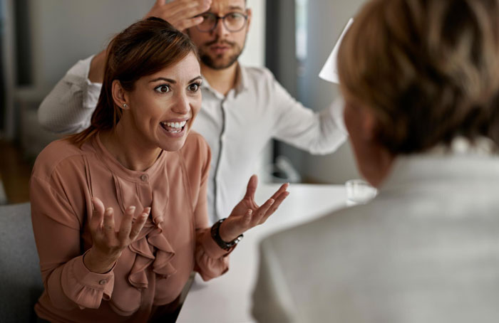 Wife feeling hurt and disrespected, arguing with husband who approved family&rsquo;s long stay without asking her.
