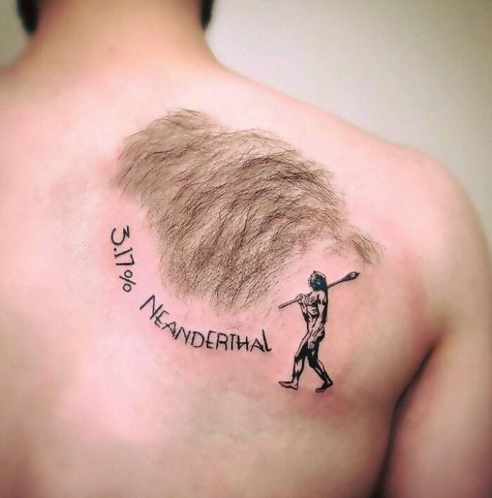 Tattoo fail featuring Neanderthal text and a primitive man next to a patch of real hair, illustrating a permanent ink regret.