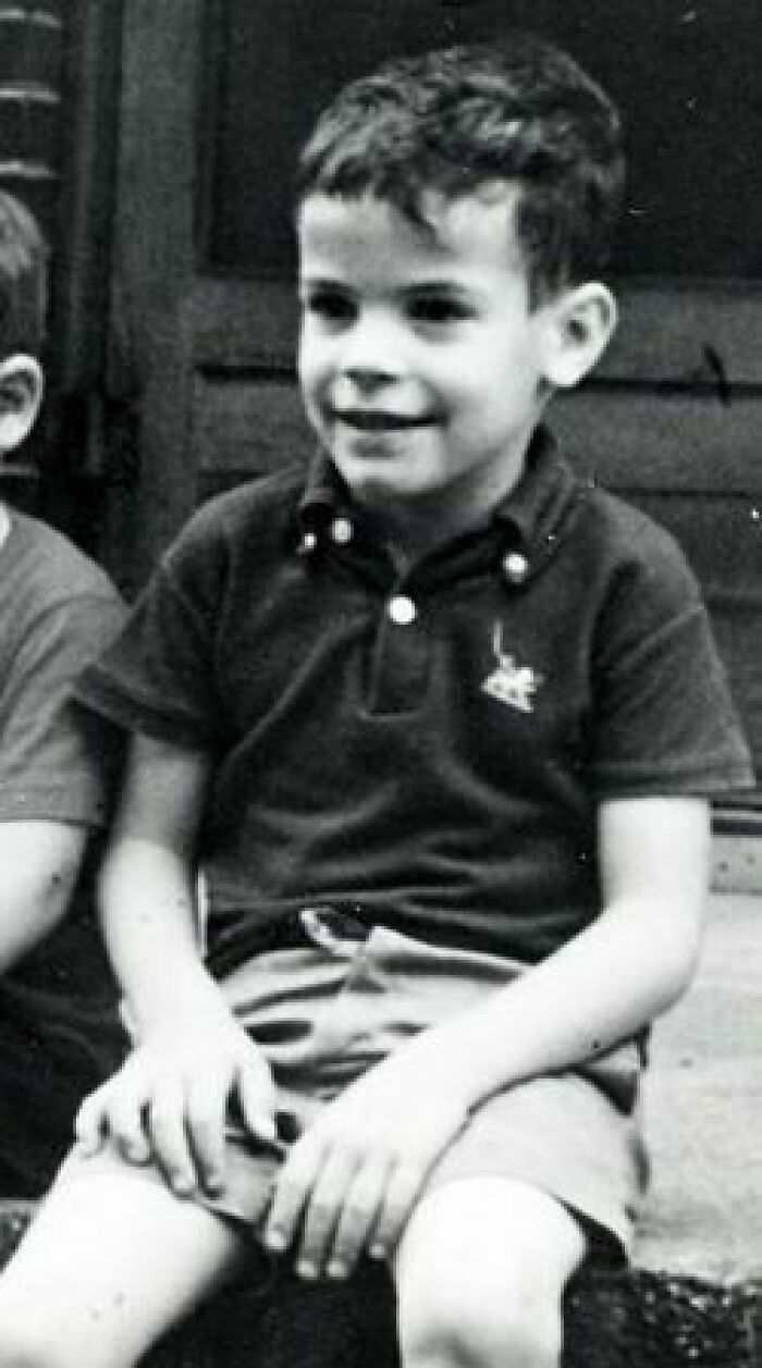 Black and white image of a young boy sitting, illustrating disturbing images proving real life can be a nightmare.