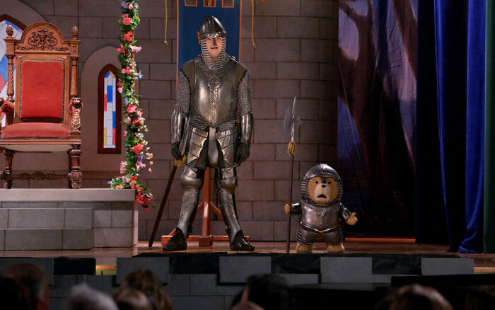Seth Macfarlane in armor standing next to Ted puppet on stage, referencing Ted Season 2 release and possible end.
