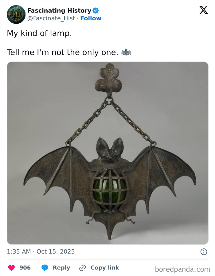 Antique bat-shaped lamp with a green glass center, showcasing historical treasures that reveal advanced past craftsmanship.