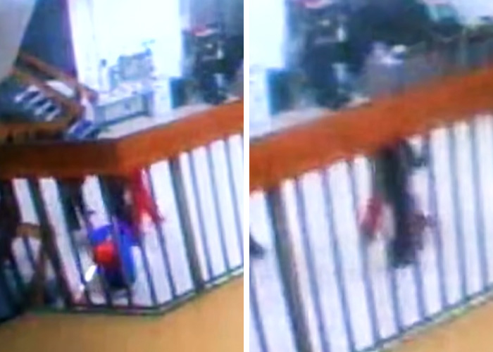 Surveillance footage of a person near a railing linked to Epstein prison guard events before his passing.