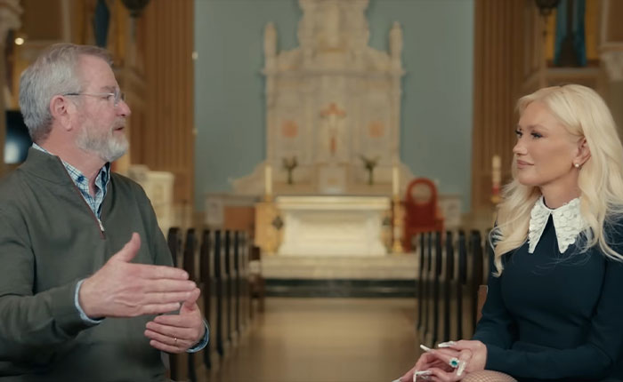 Gwen Stefani discussing her Christian pivot during an interview in a church setting with a male speaker.