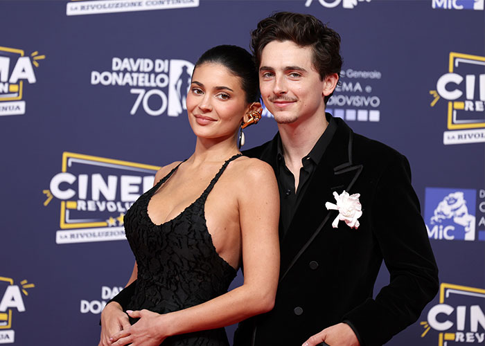 Timoth&eacute;e Chalamet and female companion at a film event, highlighting academy insider claims about his Oscar chances.