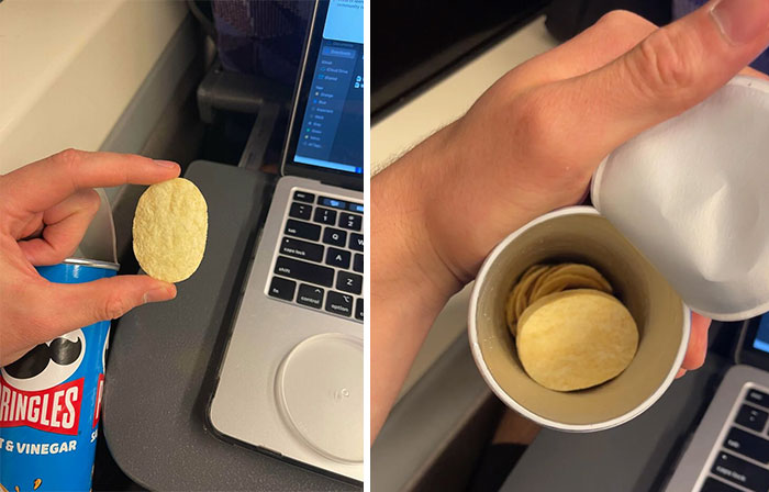 Hand holding a single Pringles chip next to an almost empty can, illustrating obvious shrinkflation in snacks.