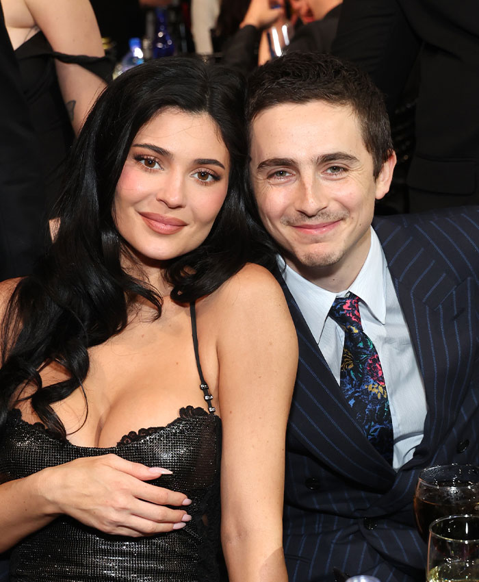 Kylie Jenner and her boyfriend smiling at an event, sparking Hollywood rumors and whispers among his peers. Kylie Jenner and her boyfriend smiling at an event, sparking Hollywood rumors and whispers among his peers.