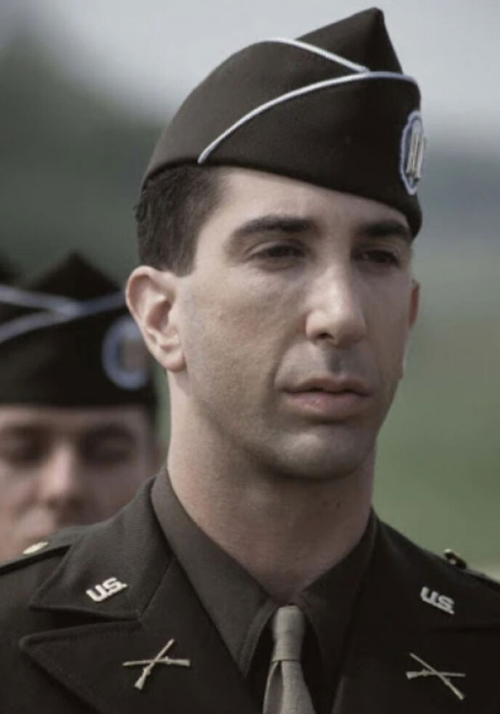 Close-up of a man in a vintage military uniform, featured in movie and film industry memes for cinephile humor.